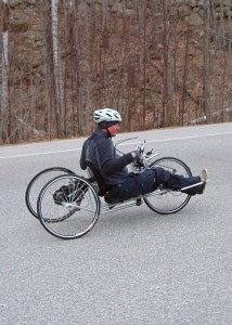 Even if you legs no longer work you can still cycle. Geoff Krill, the winter sports director at New England Disabled Sports at Loon Mountain, who lost the use of his legs in a snowmobile accident shows how it's done in a hand cycle. (EasternSlopes.com)