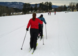 Puffy jackets and warm mittens kept these two cross counttry skiers warm on a COLD morning out on the cross country trails.