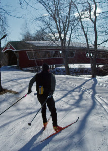 Snow covered bridge! You can ski right over the Ellis River on this beautiful covered bridge in Jackson, NH on the network of trails maintained by Jackson XC. (Tim Jones/EasternSlopes.com)