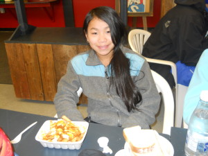 Kim Han Fuller trying poutine for the first time.
