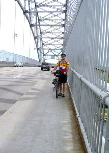 Walking our touring tandem across the Bourne Bridge. Crossing the bridge is the symbolic start and end of any Cape Cod/Islands getaway. Donnelly/EasternSlopes.com)