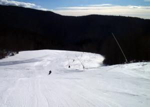 On a cold, bright winter morning, East Slope and adjacent trails at Cranmore Mountain are sunny and sheltered from any wind. (Tim Jones/EasternSlopes.com)