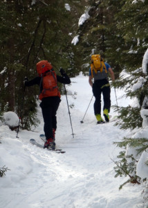 A ski lift is faster and easier, but there’s a certain satisfaction to climbing a backcountry ski trail under your own power. Of course skiing DOWN a steep, 6-foot wide trail has its challenges, too. (EasternSlopes.com photo)