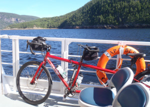 Bikes and ferry boats go together. By taking our tandem touring bike aboard the Crosiere's du Fjord shuttle ferry on Saguenay Fjord, we set ourselves up for a perfect bike ride the next day. (Tim Jones/EasternSlopes.com)