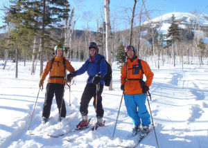 The heart of Brackett Basin is that wooded slope behind us to the left of the visible trails at Sugarloaf . A screaming wind overnight had scoured away most of the powder, but there was still plenty on the runout. (EasternSlopes.com)