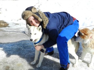 A happy camper with one of Kathy Bennett's Braeburn Siberians. {Photo: Deborah Lee Luskin, EasternSlopes.com]