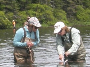 Jesse talked me through reeling it in and grabbed the line to show me the Brookie – a gorgeous, spotted fish!  (Photo courtesy of Maryanne St. Jean)
