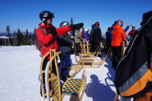 Pierre points out the first turn in the sledding trail as he goes over some rules of the road before we take to the luges. (Jonathan Gourlay photo)