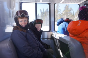 You can ride a cat like this to the put in for guided off-piste skiing or the mountain's sledding adventure like these happy campers. (Jonathan Gourlay photo)